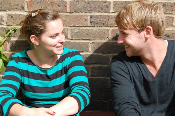 0050_young_people_talking_576x383